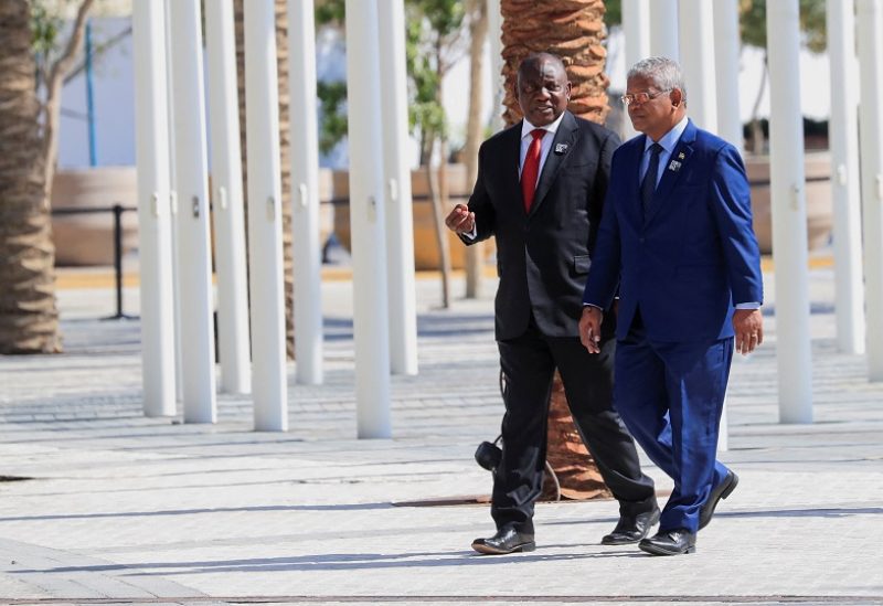 South Africa's President Cyril Ramaphosa and Seychelles' President Wavel Ramkalawan walk together after a family photo, ahead of the World Climate Action Summit during the United Nations Climate Change Conference (COP28), in Dubai, United Arab Emirates, December 1, 2023. REUTERS/Thomas Mukoya
