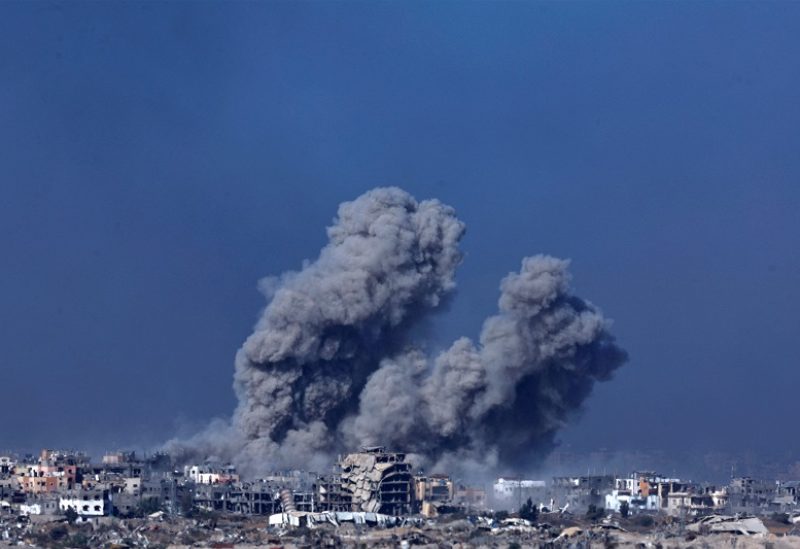 Smoke and debris rises over Gaza, amid the ongoing conflict between Israel and the Palestinian Islamist group Hamas, as seen from southern Israel, December 11, 2023. REUTERS/Clodagh Kilcoyne