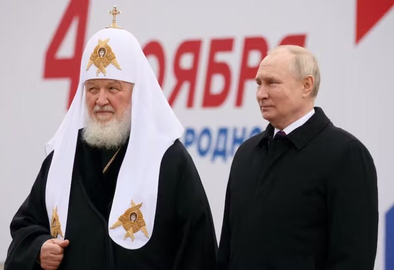 Russian President Vladimir Putin and Patriarch Kirill of Moscow and All Russia take part in a flower-laying ceremony at the monument to Kuzma Minin and Dmitry Pozharsky while marking Russia's Day of National Unity in Red Square in central Moscow, Russia November 4, 2023. Sputnik/Mikhail Metzel/Pool via REUTERS/File Photo