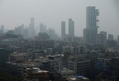A general view of high-rise residential buildings amidst other residential buildings in Mumbai, India, December 1, 2023. REUTERS/Francis Mascarenhas