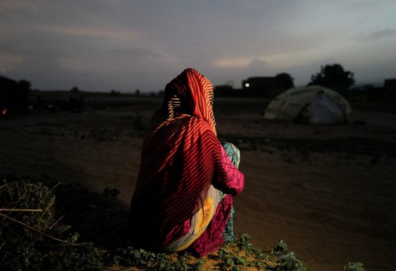 A 24-year-old mother, who said she was raped by armed militiamen in El Geneina, West Darfur, poses outside a makeshift shelter in Adre, Chad, July 21, 2023. REUTERS/Zohra Bensemra To Match Special Report SUDAN-POLITICS/SEXUAL-VIOLENCE